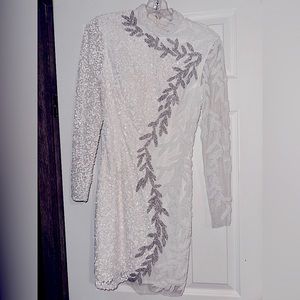 This dress was worn 1 time. I wore it for homecoming, and now I just have no use